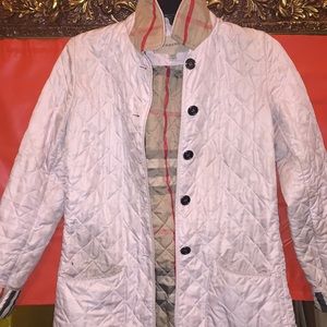 Pink Burberry trench coat